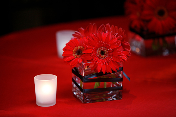 red gerbera daisy centerpiece - wedding photo by Merri Cyr